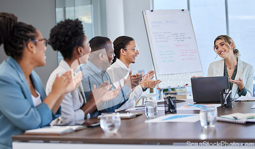 Image of Winner, success or applause of business people in a meeting or presentation for sales goal or target. Support, achievement or happy woman in leadership with smile or pride for winning a contract deal