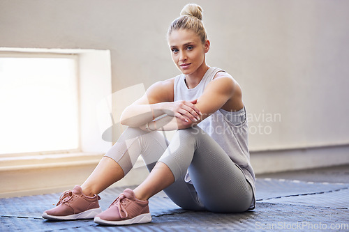 Image of Woman in gym, fitness portrait and athlete on mat for yoga or pilates, exercise and health in active lifestyle. Sport, personal trainer and focus, motivation for body training, muscle and strong