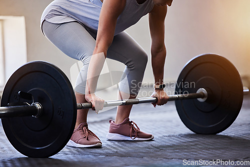 Image of Woman bodybuilder, barbell deadlift and gym for wellness, fitness or exercise for strong body on floor. Weightlifting, muscle development or workout for health, challenge or performance for self care