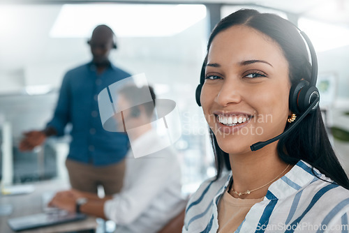 Image of Black woman, portrait and call center worker with a smile on a crm sale call in a office. Networking, telemarketing and happy ecommerce employee working on contact us customer service consultation