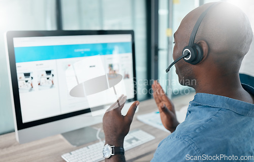 Image of Call center, computer screen and black man in customer service, crm and telemarketing office. Man consultant talking with hands at pc for sales, contact us and online support or IT solution advice