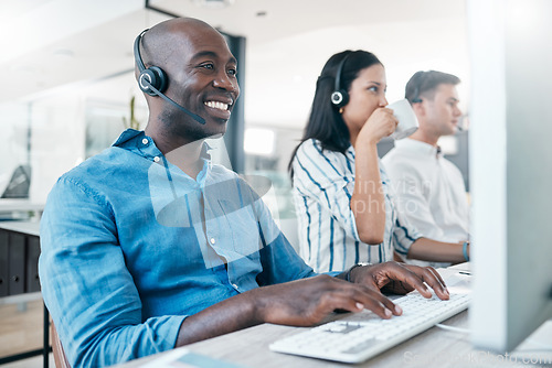 Image of Call center, computer and team online for customer service, crm and telemarketing in office. Black man and woman consultant at pc with data analysis for sales, contact us and online support or advice