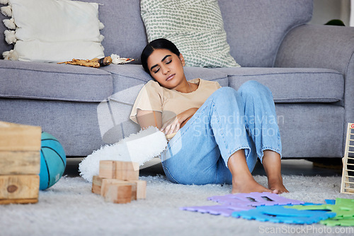 Image of Woman, housekeeper and sleeping on living room sofa for cleaning, hygiene or service at home. Tired female cleaner exhausted suffering from burnout or fatigue resting and dreaming by lounge couch