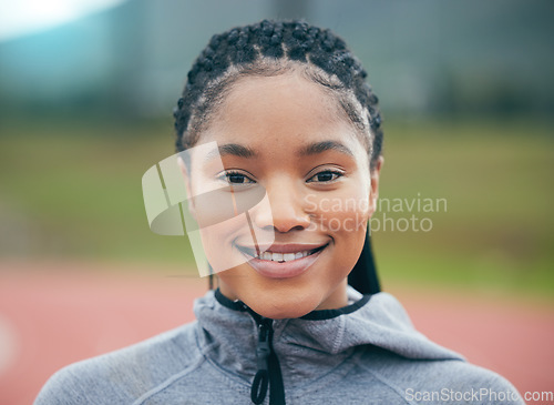 Image of Fitness, portrait and black woman athlete with smile for workout, training or exercise goals outdoor in park. Face of a young african runner person with sports vision, mission and goals at stadium