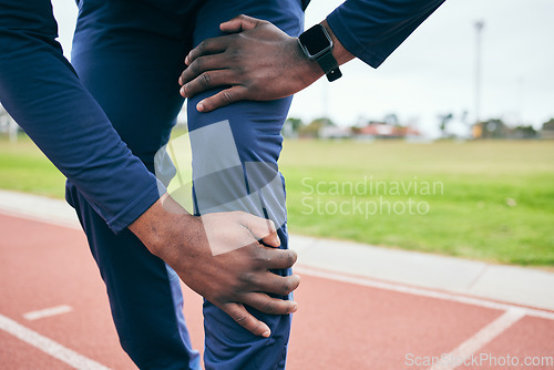 Image of Knee pain, injury and black man runner, fitness and race in stadium, training for marathon or relay outdoor. Running, sports accident and inflammation, emergency with muscle tension and mockup space