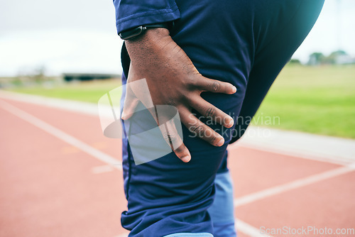 Image of Leg pain, injury and black man runner, fitness and race in stadium, training for marathon or relay outdoor. Running, sports accident and inflammation, emergency with muscle tension and mockup space