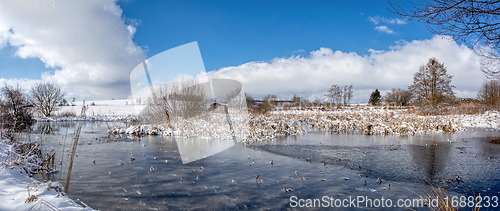 Image of Beautiful winter rural landscape with pond