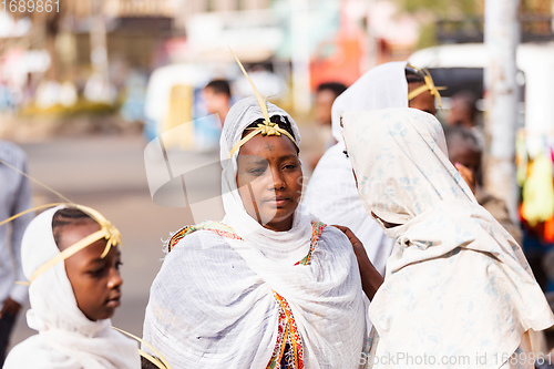 Image of Orthodox Christian pilgrim at worship on the street during easter