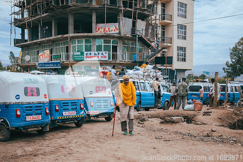 Image of Traditional means of transport in Ethiopia, blue color auto rickshaw known as Tuk tuk on street