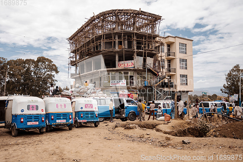 Image of Traditional means of transport in Ethiopia, blue color auto rickshaw known as Tuk tuk on street
