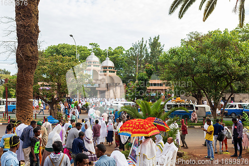 Image of Orthodox Christian pilgrim at worship on the street during easter