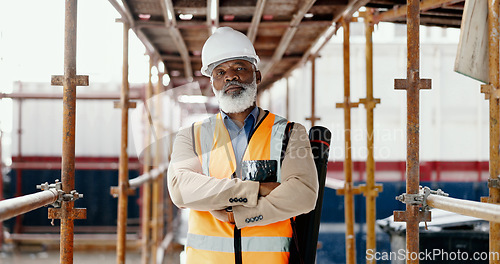 Image of Construction, building and mature architect with design, vision and idea for development while working at a construction site. Portrait of elderly industrial worker with arms crossed for architecture