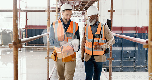 Image of Construction, building and tablet with an architect and engineer on site planning on the internet with an online blueprint. Team, architecture and technology with business colleagues in collaboration