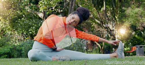 Image of Stretching, calm and breathing woman on grass in park or nature environment for fitness workout session. Wellness and health lifestyle of sports person doing muscle relax exercise sitting on ground