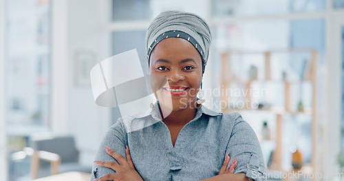 Image of Face, black woman and arms crossed in office, business and leadership. Nigerian female administrator, lady or entrepreneur with smile, startup company or leader for marketing campaign and advertising