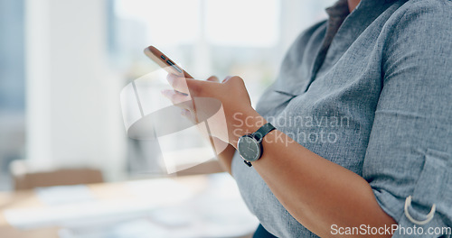 Image of Business woman, hands and phone in social media texting for communication, chatting or browsing at the office. Hand of female employee typing, searching or online conversation on mobile smartphone