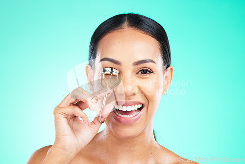 Image of Eyelash curler, beauty and portrait of happy woman on studio background. Female model, eyelashes and metal tools for skincare, aesthetics and facial makeup product, face cosmetics and transformation