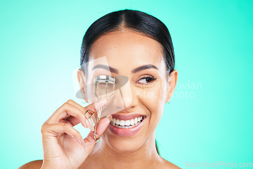 Image of Eyelash curler, beauty and smile of woman on studio background. Happy female model, eyelashes and metal tools for skincare, aesthetics and facial makeup product, face cosmetics and transformation