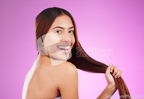 Image of Beauty, hair and happy woman isolated on purple background for healthy glow, shine and care in studio. Young gen z model, youth or black person in portrait for natural growth, color and salon mockup