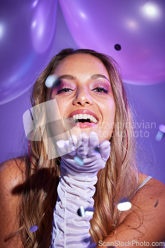 Image of Beauty, confetti and portrait of a happy woman in a studio with balloons for a birthday celebration. Happiness, cosmetic and female model blowing a kiss with makeup by purple background and aesthetic