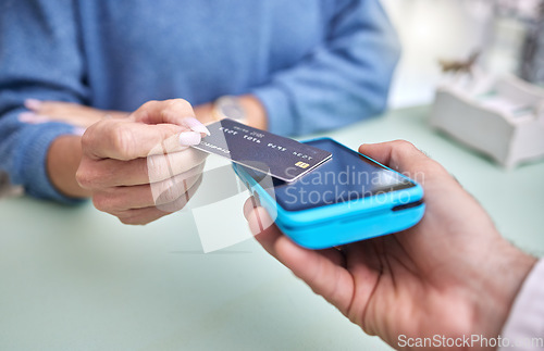 Image of Shopping, hands or payment with a credit card by a customer checkout transaction at optometrist. Finance, zoom or people make a fintech electronic machine purchase or point of sale at a retail store