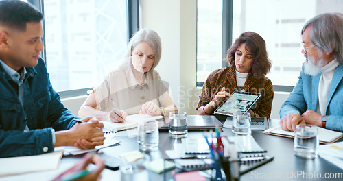 Image of Business people, tablet and teamwork for planning, strategy and ideas by desk in modern office for goal. Corporate group, digital tech and finance team for brainstorming, vision or target in New York