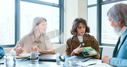 Image of Business people, tablet and teamwork for planning, strategy and ideas by desk in modern office for goal. Corporate group, digital tech and finance team for brainstorming, vision or target in New York