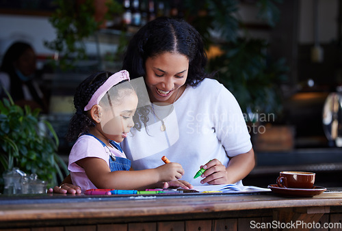 Image of Learning, drawing and mother with girl at cafe with books, studying and art education. Family, love and mama teaching kid how to color with crayons, having fun and bonding together in restaurant shop