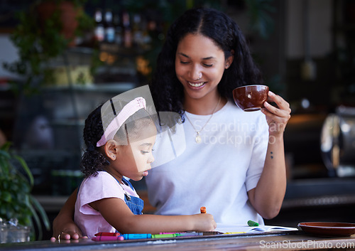 Image of Learning, drawing and girl with mother at cafe with books, studying and art education. Family care, love and mama teaching kid how to color with crayons, having fun and bonding together in restaurant