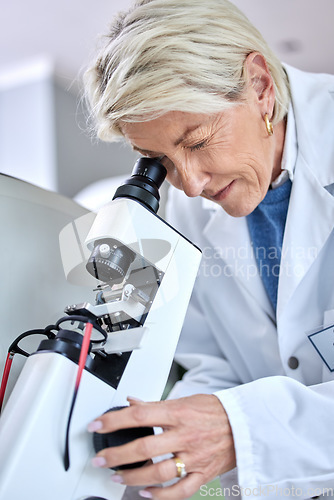Image of Doctor woman, ophthalmology and microscope for glasses tools to check and zoom on lens. Medical person at work for science, vision and health insurance working in lab, store or clinic for eye care