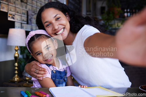 Image of Mother portrait, girl child and selfie in cafe with book for drawing, learning art and color. Education, family and mama hug kid or daughter and taking pictures for social media or happy memory.