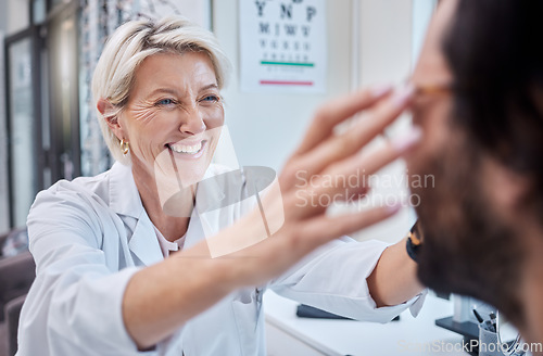 Image of Optometrist, woman and helping customer with eyes, glasses and vision in store. Face of happy optician, new frames and consulting services in retail shop, clinic and choice for health, trust and test