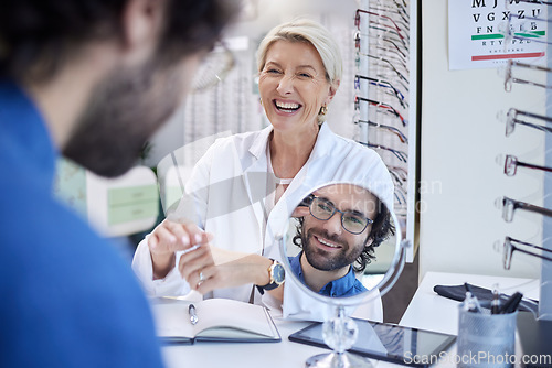 Image of Mirror, glasses or happy man consulting a doctor for professional eyesight advice with at a retail store. Customer checking to see vision health with a trusted senior optician or ophthalmologist