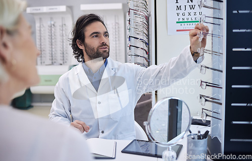 Image of Eye doctor, glasses or woman consulting for eyesight advice at optometrist or ophthalmologist with medical aid. Customer talking or asking questions to check vision health with a helpful optician