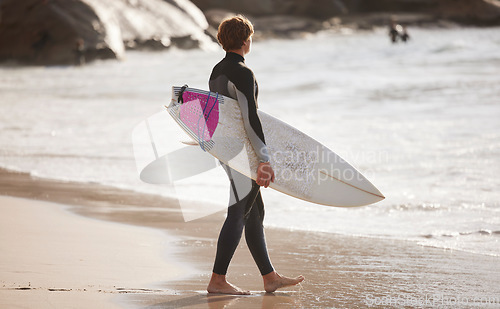 Image of Surfing on beach, man with surfboard for sport outdoor, ocean and travel with mockup space and nature. Adventure, extreme sports and athlete walking, active lifestyle with surf on sea waves in Miami