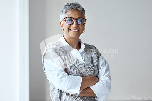 Image of Portrait, senior and consultant or business woman confident, proud and positive mindset in a home, house or apartment. Happy, calm and proud elderly female with a vision, mission and motivation