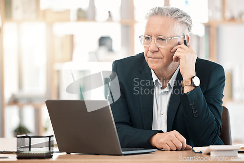 Image of Senior businessman, laptop and financial advisor thinking at office desk for corporate statistics. Elderly male finance manager or CEO contemplating investment, trade or company goals for marketing