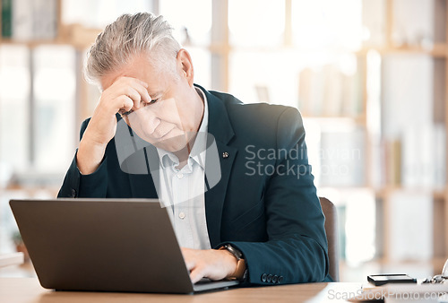 Image of Stress, laptop and management with a senior man in business feeling anxiety or the pressure of a deadline. Computer, glitch and corporate with a mature male manager working on a review in his office