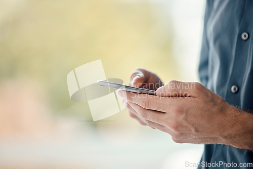 Image of Man hands, phone and mobile networking of a businessman in a office on web. Online communication, text writing and technology of a social media writer employee with mock up and blurred background