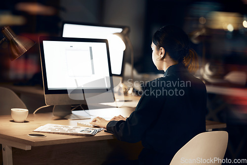 Image of Office, overtime and woman at computer, developer with data innovation at tech startup. Internet, web design and designer working late at night on future software ideas for technology for company.