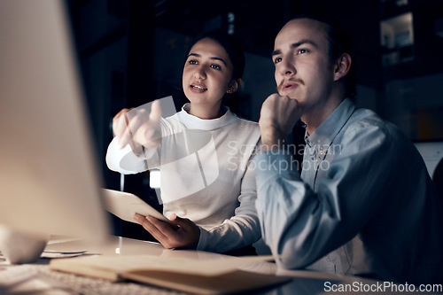 Image of Computer, teamwork and people night office for information technology, programming and software development. Programmer, coding and cybersecurity analytics woman with partner on pc strategy in dark