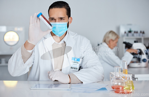 Image of Science, mask and man with blood, laboratory and experiment for cure, diagnosis and dna information. Face cover, male scientist and research with vial, check liquid and test tube for results in lab