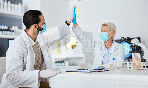 Image of Science, man and woman with high five, mask and breakthrough with positive results, test and cure in lab. Research, male scientist and female research with face cover, gesture for success or teamwork