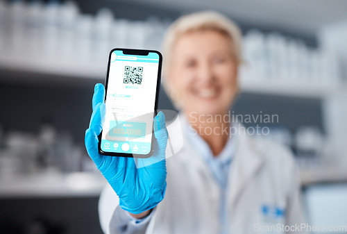 Image of Phone, screen and doctor woman with QR code for drugs test results, compliance and safety in laboratory. Smartphone, mobile app ux and negative feedback for online scientist or science data review