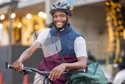 Image of Black man, bicycle and portrait smile in the city for travel, trip or delivery with bag outdoors. Happy African American male on bike smiling for traveling, adventure or transport in an urban town