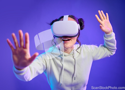 Image of Woman in metaverse with virtual reality glasses for futuristic gaming, cyber and 3d world. Excited gamer person with hand for wow ar, digital experience and creative cyberpunk purple background app