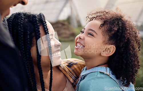 Image of Black family, farm or face with a girl, mother and father playing outdoor on a field for agriculture. Kids, happy or bonding with parents and their daughter together for sustainability farming