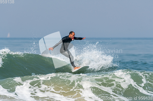 Image of Surfing the waves