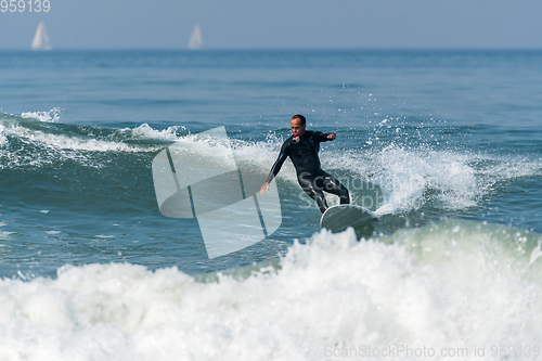 Image of Surfing the waves