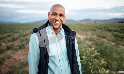 Image of Farmer, happy or portrait in countryside field, agriculture nature or sustainability environment with plants growth goals. Smile, worker or farming man with success mindset, agro vegetables or ideas